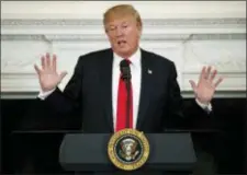  ?? EVAN VUCCI — THE ASSOCIATED PRESS ?? President Donald Trump speaks during a meeting with the members of the National Governors Associatio­n in the State Dining Room of the White House, Monday in Washington.