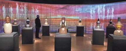  ?? The exhibit “Preston Singletary: Raven and the Box of Daylight” is on view Thursday, Nov. 9, 2023 at the Oklahoma City Museum of Art. Running through April 28 at the OKC museum, the multi-sensory experience combines glass, video, and audio to tell the sto ??