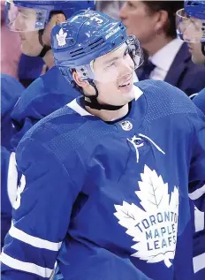  ?? FRaNK GUNN/THE CANADIAN PRESS FILES ?? Toronto Maple Leafs defenceman Justin Holl was all smiles after his first career goal in his first NHL game last January. He’s been a healthy scratch in all nine games this season.