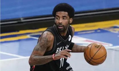  ?? Photograph: Frank Franklin II/AP ?? The Nets decided on 17 December that Kyrie Irving would practice with them and play road games,even though he remains unable to play at home.