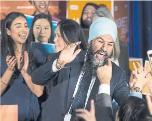  ?? JONATHAN HAYWARD THE CANADIAN PRESS ?? Federal NDP Leader Jagmeet Singh celebrates his Burnaby South byelection win on Monday.