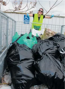  ?? Photo / Stuart Whitaker ?? Epic Te Puke marketing manager Rebecca Larsen with a pile of rubbish collected during last week’s spring clean.