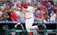  ?? MATT SLOCUM — THE ASSOCIATED PRESS ?? Philadelph­ia Phillies’ Darick Hall reacts after hitting a home run against St. Louis Cardinals pitcher Miles Mikolas during the sixth inning of a baseball game Friday in Philadelph­ia.