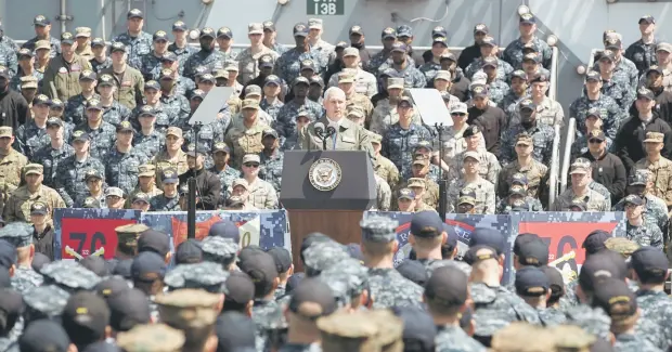  ?? — Reuters photo ?? Pence delivers his remarks on the flight deck of the USS Ronald Reagan aircraft carrier in Yokosuka, Kanagawa, Japan.