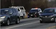  ?? ?? Aggressive Driver Enforcemen­t in Exeter An Exeter Township Police officer stops a vehicle along Rte. 422 in the township Wednesday, March 30, 2022, as part of a state-wide aggressive driver crackdown.