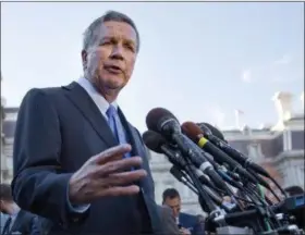  ?? PABLO MARTINEZ MONSIVAIS — THE ASSOCIATED PRESS FILE ?? Ohio Gov. John Kasich, following a ceremony where President Barack Obama honored the 2016 NBA champion Cleveland Cavaliers basketball team, answers questions from reporters outside the West Wing of the White House in Washington. Kasich and three other...