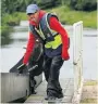  ?? PHOTO: RE-UNION CANAL BOATS ?? Doug Hannah Wilson at work on the canal.