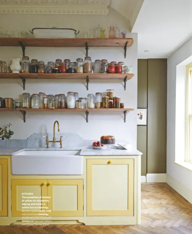  ??  ?? KITCHEN
The gradation of shades of yellow on woodwork, edging and knobs is subtle but enchanting. Marble-topped units, sink and reclaimed shelving, designed by Ben Pentreath. Joinery in Dayroom Yellow and Citron, Farrow & Ball