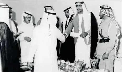  ?? Gulf News Archives ?? Man of the majlis
Shaikh Khalifa receives visitors at his Al Ain majlis in 1968. A man of the masses, Shaikh Khalifa was easily accessible at his majlis and never let anyone leave without someone looking into the request or grievance.