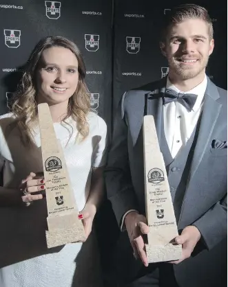  ?? GAVIN YOUNG ?? Laval soccer star Arielle Roy-Petitclerc, left, and UNB hockey standout Philippe Maillet display their awards after being named the U Sports athletes of the year.