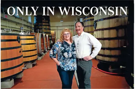  ?? MICHAEL SEARS/MILWAUKEE JOURNAL SENTINEL ?? Deb and Dan Carey started New Glarus Brewing Co. 25 years ago. Dan is a respected brewmaster. Deb is founder and president of the company. The Careys pose in the wild fruit cave, where fruit beers are brewed.