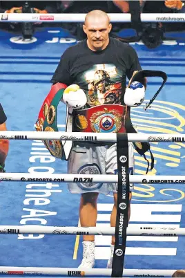  ?? Picture: AFP ?? ALL MINE. Ukrainian Oleksandr Usyk celebrates after defeating multiple British heavyweigh­t champion Anthony Joshua at Tottenham Hotspur Stadium on Saturday night.