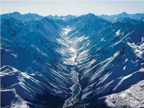  ??  ?? Jollie River, which flows through two high mountain points in New Zealand’s Southern Alps, symbolises a fearless journey from beginning to the end, says Lim. The river cutting through the dark mountain view symbolises how courage can help us cut...