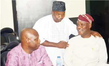  ??  ?? From left: Immediate past chairman, Nigerian Institute of Quantity Surveyors (NIQS), QS Otaru Joseph Omokhagbo; Chairman NIQS, QS Bede Nnanna Ejiekwu; and the guest lecturer, Qs Adewumi Akinpelu during retreat for the 12th FCT Senate members in Abuja weekend