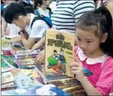  ?? GAO ERQIANG / CHINA DAILY ?? Children’s books make up more than 40 percent of the total sales volume of books in China.