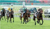  ?? RACE IMAGES SOUTH ?? Legarto, at right, leaves the 1000 Guineas field in her wake at Riccarton yesterday.