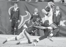  ?? Brett Coomer / Houston Chronicle ?? Former teammates at Central Florida, the Texans’ A.J. Bouye, left, has had a chance to catch up with the Jaguars’ Blake Bortles in the NFL.