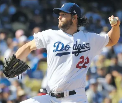  ?? MARK J. TERRILL / THE ASSOCIATED PRESS ?? Looking to extend the NLCS, the Los Angeles Dodgers will send ace pitcher Clayton Kershaw to the mound in Game 6 against the Chicago Cubs Saturday at Wrigley Field. The Dodgers trail the series 3-2.