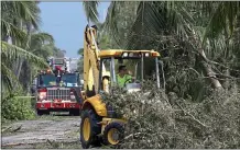  ??  ?? DEVASTATIO­N: Ashtead equipment is used after the storm