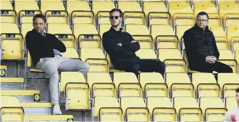  ??  ?? Sporting director Kristjaan Speakman, owner Kyril Louis-Dreyfus and head of recruitmen­t Stuart Harvey watch.