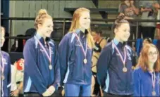  ?? PHOTO BY MARY REGAN ?? Villa Maria’s trio of Katherine Fronczak, Kaitlyn Agger and Alexa Turco stand on the podium Sunday at La Salle after going 1-2-3 in the 500 meters.