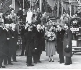  ??  ?? Left: In 1940 King George VI and Queen Elizabeth visited the East Works of Longbridge. Here the royal couple are accompanie­d by Lord Austin himself (facing the camera) and Leonard Lord (second from right). A Fairey Battle is taking shape in the...