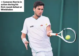  ??  ?? > Cameron Norrie in action during his first-round defeat at Wimbledon