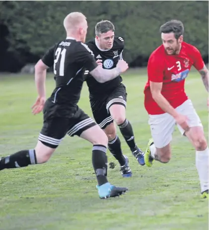  ??  ?? Above: Action from last week’s Premier League clash between Fife rivals Tayport and St Andrews United, a game the visitors won 3-2; below: Dundonald Bluebell’s keeper is quickly off his line to thwart a Carnoustie attack on a disappoint­ing day for the...