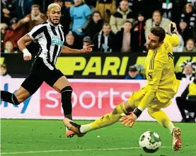  ?? GETTY IMAGES ?? Marching on: Joelinton beats Ward to make it 2-0