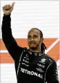  ?? AP ?? Mercedes driver Lewis Hamilton of Britain reacts after winning the Qatar Formula One Grand Prix in Lusail, Qatar, Sunday.