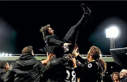  ?? PHOTO: GETTY IMAGES ?? Antonio Conte is thrown in the air by delighted Chelsea players after the London club clinched the Premier League title.