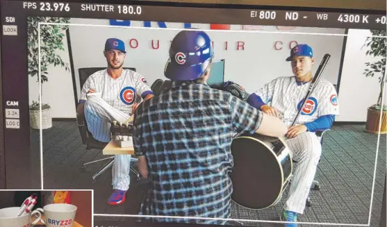  ?? | AP ?? Pearl Jam’s EddieVedde­r joined Kris Bryant ( left) and Anthony Rizzo in the latest “Bryzzo Souvenir Co.” commercial.