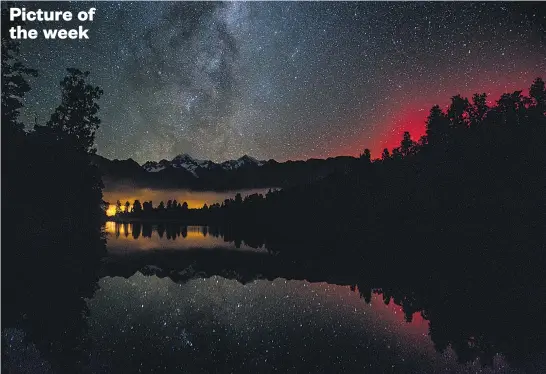  ?? Picture / Adrian Fong ?? The Aurora Australia at Lake Matheson on the South Island's West Coast.