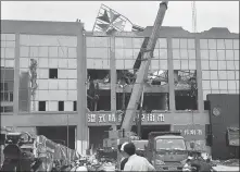  ?? TANG HUIJI / FOR CHINA DAILY ?? The roof of a bar in Baise, Guangxi Zhuang autonomous region, named 0776Plus Club, collapsed early on Monday. Four people were killed and 87 were injured.