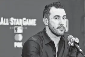  ?? Tony Dejak / Associated Press ?? Justin Verlander has been outspoken in accusing MLB of juicing of the baseball. Commission­er Rob Manfred counters it’s nothing more than a conspiracy theory.