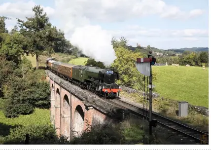  ?? PHILIP MACEY ?? With the Gresley teak set in tow, Flying Scotsman crosses Oldbury Viaduct on September 22.