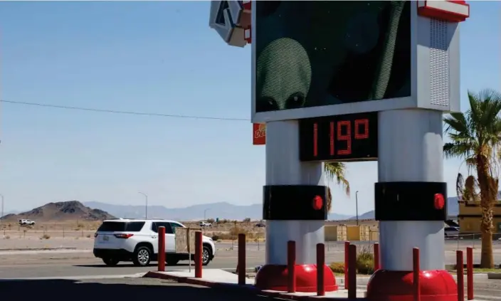  ?? Photograph: Caroline Brehman/EPA ?? A thermomete­r showing 119F in Baker, California, on Saturday.