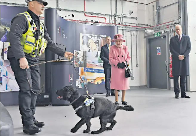  ??  ?? Oct 15
The Queen makes her first in-person engagement outside the royal residences since March. She visited staff at the national security laboratory at Porton Down, Salisbury, Wilts, alongside the Duke of Cambridge, right.