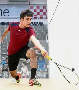  ??  ?? A cut above: Sanjay Singh Chal returning a shot to Pakistan’s Asim Khan in the men’s semi-finals of the Malaysian Tour Squash Circuit No. 3 yesterday. — SAMUEL ONG / The Star