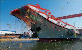  ?? by Li Gang/ Xinhua ?? April 26, 2017: China launches its first domestical­ly developed aircraft carrier in Dalian, Liaoning Province. Last year, China realized outstandin­g scientific and technologi­cal achievemen­ts, which has raised eyebrows around the world when coupled with...