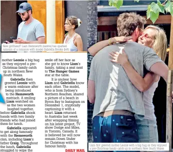  ??  ?? New girlfriend? Liam Hemsworth (centre) has sparked rumours of a romance with model Gabriella Brooks (left)
Liam first greeted mother Leonie with a big hug as they enjoyed a pre-christmas family catch up in northern New South Wales