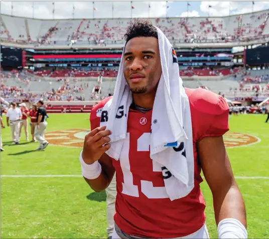  ?? [VASHA HUNT/THE ASSOCIATED PRESS] ?? Alabama quarterbac­k Tua Tagovailoa walks off the field after a 49-7 win over Southern Miss on Sept. 21 in Tuscaloosa, Ala.