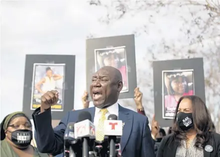  ?? WILLIE J ALLEN JR/ORLANDO SENTINEL ?? Renowned civil rights attorney Ben Crump speaks at rally in support of Liberty High School student Taylor Bracey, who was slammed to the ground by a school resource deputy in January. Crump is flanked by the victim’s mother, Jamesha Bracey, left, and civil rights lawyer Natalie Jackson, right. The case renews questions and concerns about the role, duties and training of school officers.