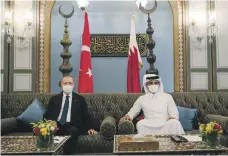  ?? AFP ?? Turkish President Recep Tayyip Erdogan, left, with the emir of Qatar, Sheikh Tamim, in Doha on Wednesday