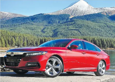  ?? PHOTOS: DEREK MCNAUGHTON/DRIVING ?? Redesigned for 2018, the 10th-generation Honda Accord features sharper styling than its predecesso­r