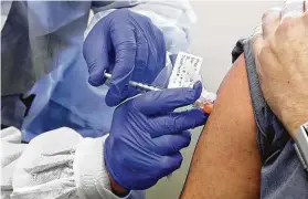  ?? Associated Press file photo ?? Moderna said preliminar­y results show its vaccine is 94.5 percent effective. U.S. Rep. Bill Flores was one of more than 30,000 people to participat­e in the trial.