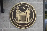  ?? FILE PHOTO ?? Madison County logo as seen outside of the highway garage in Eaton, NY.