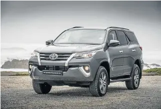  ??  ?? The Toyota Fortuner has received some minor updates, along with its Hilux sibling. Below: Some of the interior materials in the Hilux and Fortuner have been upgraded.