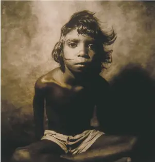  ??  ?? William Coupon: Australian Aboriginal Boy, Utopia Station, Australia, 1980, gelatin silver print