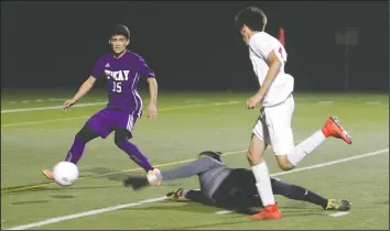  ?? PHOTOS BY DAVID WITTE/NEWS-SENTINEL ?? Above: Galt's Jason Welch, right, gets past Tokay goalkeeper Luis Alvarado on his way to a goal during Galt's 4-0 victory on Thursday at Walker Park in Galt. Galt's Nathan Villalobos, right, gets past Tokay defender Cristian Garcia.